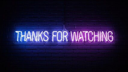 Neon sign with "THANKS FOR WATCHING" glows blue & purple on brick