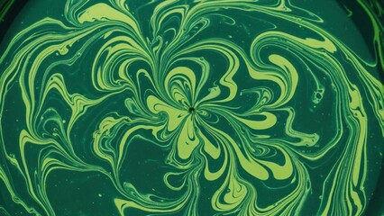 Swirling green and yellow abstract pattern resembling organic growth