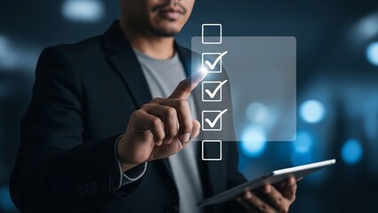 Businessman in formal attire checking off items on a digital task list during a work meeting