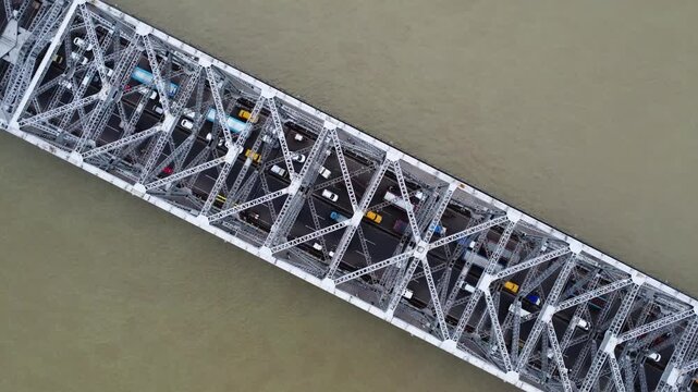 Top view of Howrah bridge (rabindra setu) near Kolkata city. old metal bridge in india. Indian bridge cinematic view.