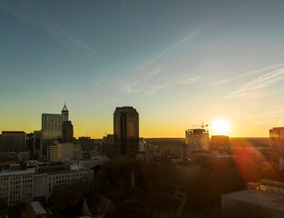 Aerial view of downtown Raleigh NC skyline at sunset looking West