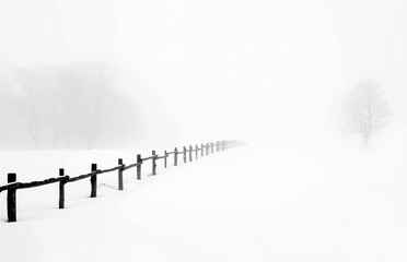 Fence receding across snowy field into dense fog, creating a serene minimalist winter scene. Generative AI.