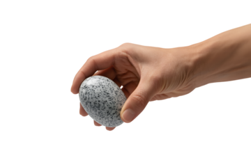 Hand holding a decorative stone egg . Isolated on transparent background, png