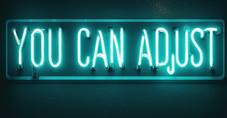 Obraz premium Bright neon sign displays positive message. Turquoise glow contrasts dark background. Simple, modern aesthetic. Encouraging words visible.