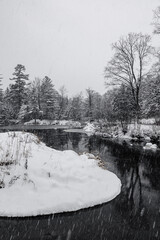Winter riverscape in park Quebec Canada