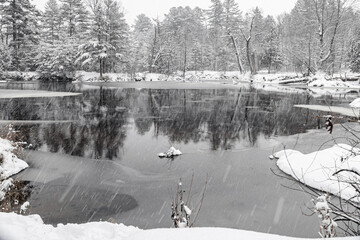 Winter riverscape in park Quebec Canada
