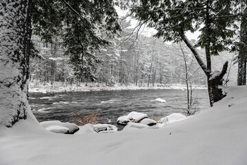 Winter riverscape in park Quebec Canada