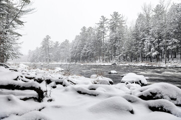 Winter riverscape in park Quebec Canada
