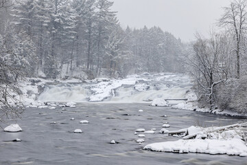 Winter riverscape in park Quebec Canada