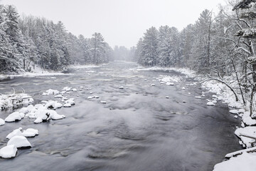 Winter riverscape in park Quebec Canada