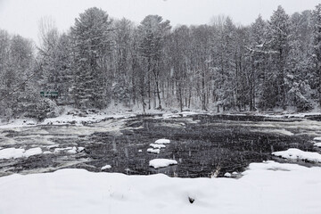 Winter riverscape in park Quebec Canada