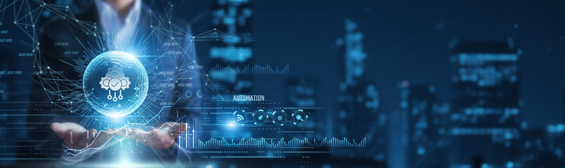 Fototapeta premium Businessman hands holding automation systems and operational data, workflow optimization, smart process control, digital business transformation