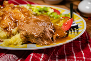 Stewed pork in its own sauce.