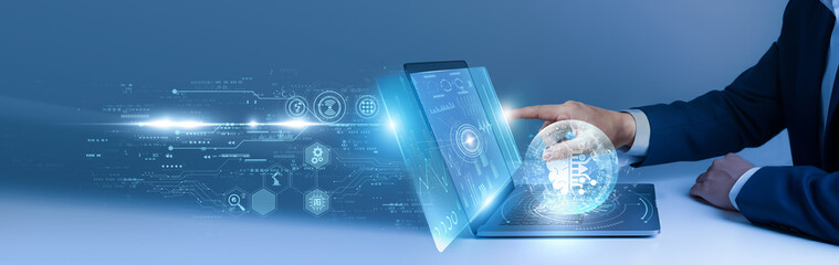 Businessman using laptop and analyze the machine learning algorithms on digital interface. AI models, predictive analytics, data processing, automation technology, smart computing