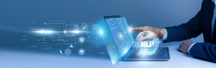 Businessman using laptop and analyze the NLP algorithms on digital interface. language AI, text analysis, speech recognition, machine learning, computational linguistics © AD