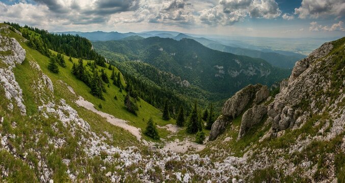 Wide panoramic view of green mountain valley with rocky cliffs, forested slopes and layered hills under dramatic cloudy sky. Natural wilderness landscape ideal for travel, nature and outdoor concepts. - Powered by Adobe