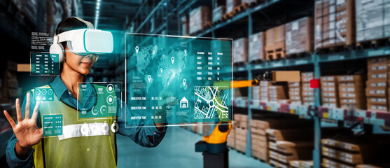 Future virtual reality technology for innovative VR warehouse management . Concept of smart technology for industrial revolution and automated logistic control .