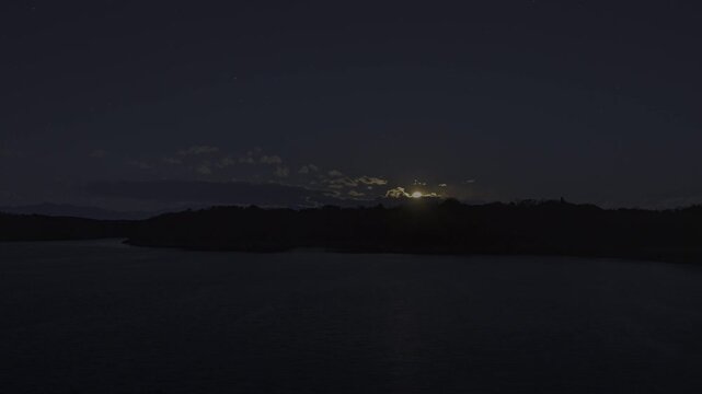 HDR (PQ) Time Lapse. Moonset and Afterglow Over Sayama Lake &ndash; Tranquil Late-Night Scene with Fading Lunar Light