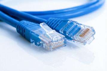 Macro detail of plastic rj45 internet plugs on white surface