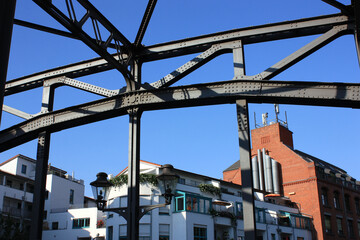 Fototapeta premium Könneritzbrücke, Historical Steel Truss Bridge over the River Weiße Elster in Leipzig, Saxony, Germany 