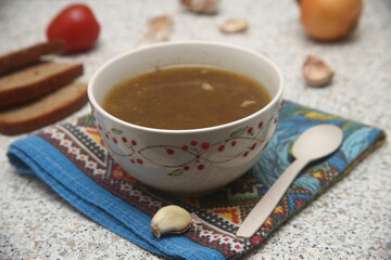 Soup with meat with spoon