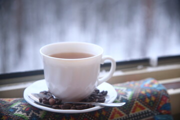 Cup of coffee with spoon