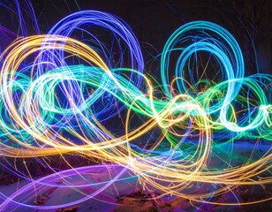 Abstract light trails swirling in vibrant colors