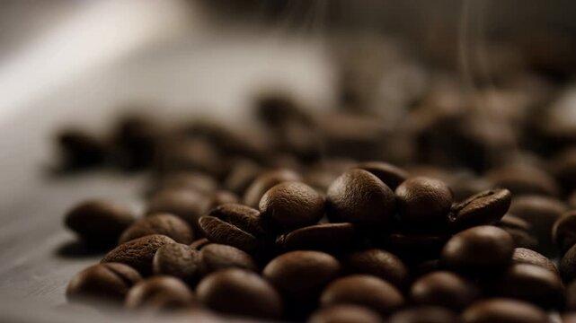 Aromatic coffee beans tumble in slow motion creating a rich, dark roast atmosphere
