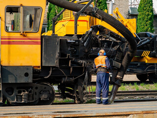 Special train for maintenance of the railway. Vacuum cleaning of railroad