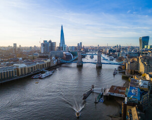 London city skyline panorama. Aerial drone view of panoramic background of London. Iconic skyline with skyscrapers, river Thames, historic landmarks