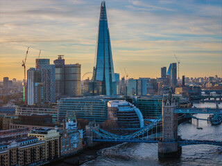 London city skyline panorama. Aerial drone view of panoramic background of London. Iconic skyline with skyscrapers, river Thames, historic landmarks