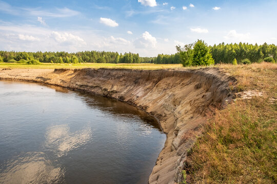 The Narew River flowing through a meadow near the skete in Odrynki.