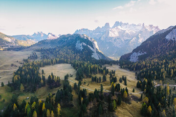 Mountain Valley and Plateau in Prato Piazza Dolomites, Italy. Epic landscape of the mountains and alpine trees with paths panoramic