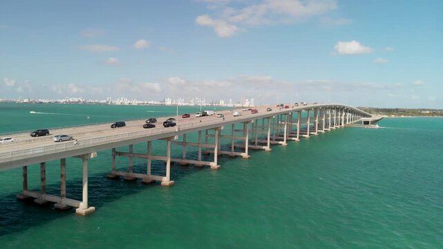 Sunny day in Miami. Rickenbacker Causeway traffic, aerial view