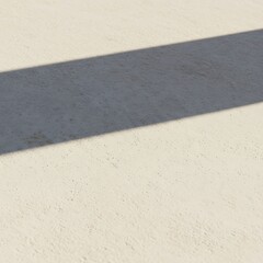 Fototapeta premium Geometric shadow pattern cast on neutral beige textured stucco surface