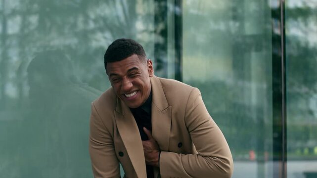 Emergency heart attack medicine African American business man clutching chest walking in city near office male employer businessman in pain suffering medical urgent health trouble ambulance outside