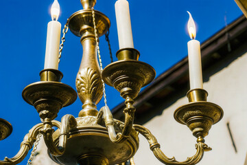 a chandel with three candles on it