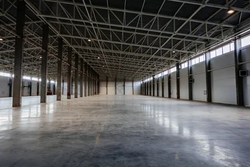 Fotobehang Gebouw in Puin Big new empty industrial building, warehouse or commercial space  © Mulderphoto