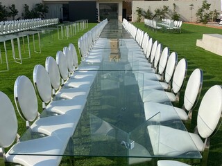 Outdoor party tables on green grass, weddings, events, companies