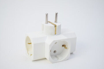 White 3-way electrical power adapter plug for European sockets, isolated on white background