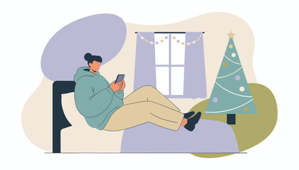 Obraz premium A person relaxes in bed using a phone near a Christmas tree Cozy home lifestyle and holiday shopping concept