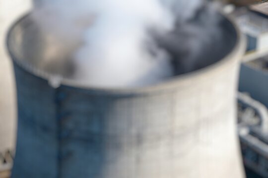 Blurry Smoking pipes of thermal power plant 