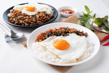 Thai food, Stir fried holy basil with minced pork with cooked rice and fried egg on top