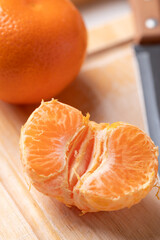 Peeled Mandarin orange fruit ready to eating