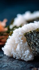 Nori sheet texture wrapping rice triangle with soft grazing light - Concept of Onigiri lunch  