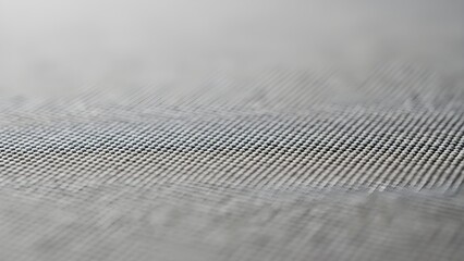 High quality close up of gray mouse pad texture with soft neutral tones, ideal for modern mouse computer, textile design, and minimalist visual projects.
