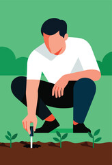 Fototapeta premium Person crouching to plant a seedling in rich soil