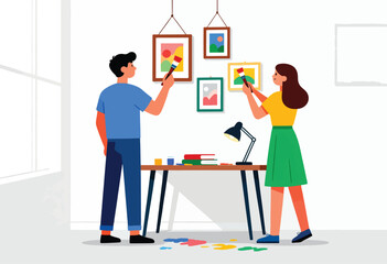 Two people painting abstract art on framed pictures hanging on a wall