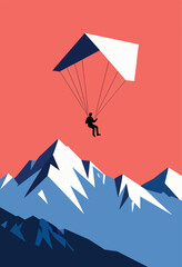 Silhouette of a paraglider soaring over snowy mountains against a coral sky