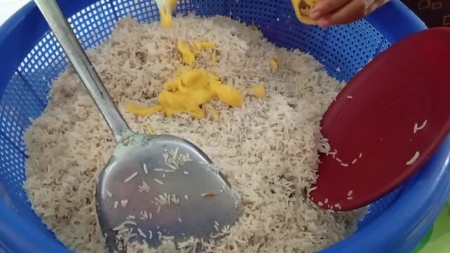 cooking rice mandhi on a bowl